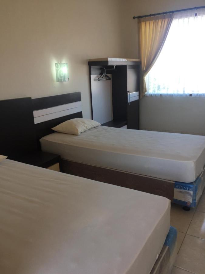 Pakerisan East Mansion Hotel Денпасар Екстериор снимка